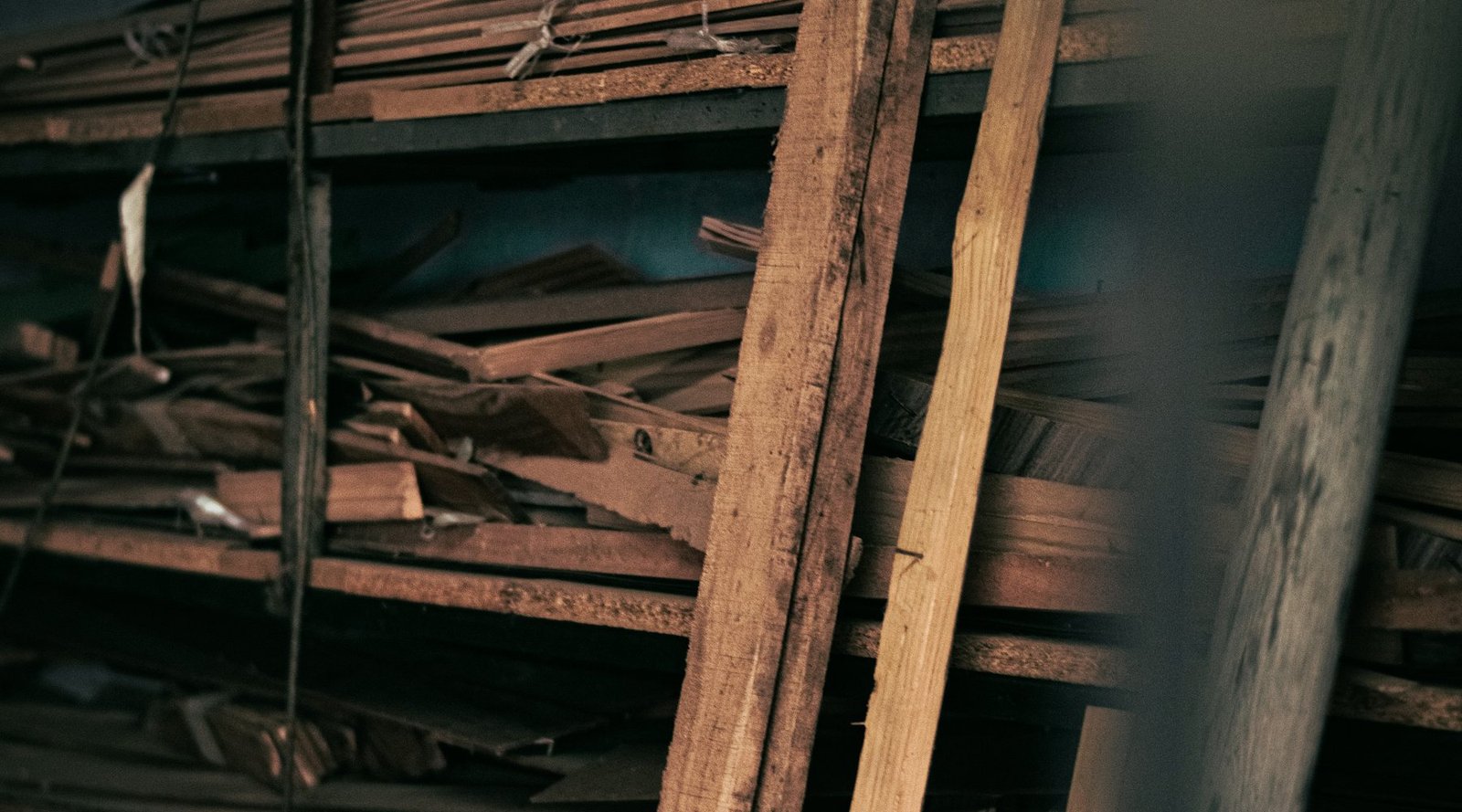 Stacked timber in the workshop store